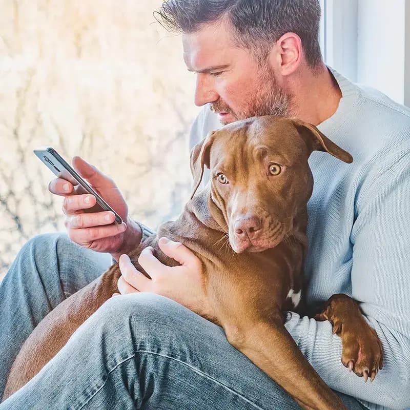 Propriétaire de chien appelle VET&GO